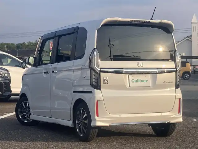 ホンダ Ｎ ＢＯＸ カスタム L 島根県 2022(令4)年 2.4万km プラチナホワイトパール ワンオーナー /ディーラーOPナビ(CD/DVD/BT/フルセグ)/レーダークルーズコントロール/衝突被害軽減ブレーキ/路外逸脱抑制/先行車発進お知らせ/レーンキープアシスト/純正フロアマット/両側パワースライドドア/ビルトインETC/前席シートヒーター /オートライト/前後ドライブレコーダー/社外AW付き冬タイヤ/取扱説明書/保証書/スペアキー×1