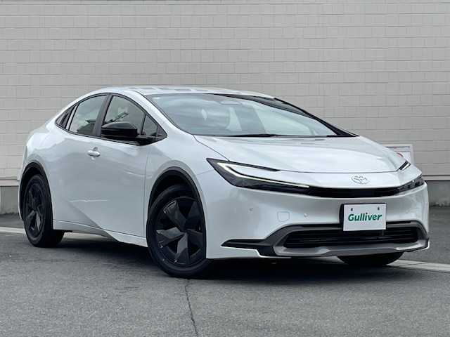 トヨタ プリウス U 静岡県 2024(令6)年 3万km プラチナホワイトパールマイカ ●純正ディスプレイオーディオ/(フルセグ/Bluetooth/AppleCarPlay)/●バックカメラ/●レーダークルーズコントロール/●プリクラッシュセーフティ/●レーンキープアシスト/●前後クリアランスソナー/●電動パーキングブレーキ/●オートブレーキホールド/●LEDヘッドライト/●オートライト/●オートマチックハイビーム/●革巻きステアリング/●ステアリングスイッチ/●ETC2.0/●前後ドライブレコーダー/●電動格納ウィンカーミラー/●純正ホイールカバー/●純正フロアマット/●スマートキー/●プッシュスタート/●レベライザー/●ダブル+サイドSRS+ABS