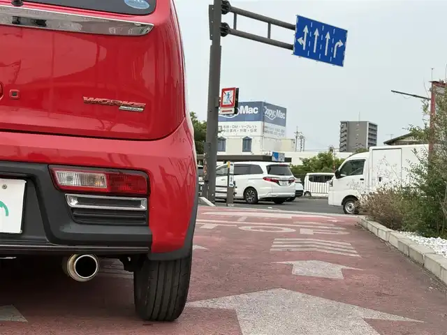 スズキ アルト ワークス 香川県 2016(平28)年 8.9万km ピュアレッド 社外SDナビ/CD/DVD再生/純正15インチアルミ/キセノンヘッドライト/HKSマフラー/デジタルミラー/スマートキー/マット