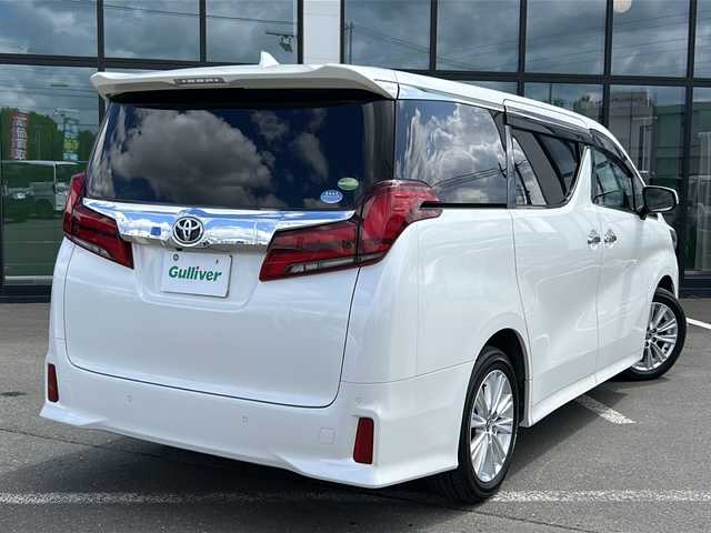 トヨタ アルファード S 岩手県 2018(平30)年 5.4万km ホワイトパールクリスタルシャイン ・４WD/・寒冷地仕様/・純正１０インチナビ/（CD・DVD・フルセグTV・BT・AM・FM）/・純正１２．１インチフリップダウンモニター/・バックカメラ/・社外前後ドライブレコーダー/・両側パワースライドドア/・純正エンジンスターター/・レーダークルーズコントロール/・レーンキープアシスト/・衝突被害軽減ブレーキ/・車線逸脱警報/・アイドリングストップ/・オートホールドブレーキ/・横滑り防止装置/・本革巻きステアリング/・オートライト/・オートハイビーム/・スマートキ/・プッシュスタート/・社外フロアマット/・ドアバイザー/・純正LEDヘッドライト/・フロントフォグランプ/・純正１８インチAW/・保証書/・車両取扱説明書/・ナビ取扱説明書