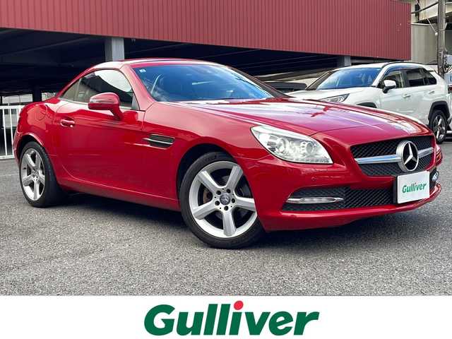 メルセデス・ベンツ ＳＬＫ２００ ブルーエフィシェンシー 神奈川県 2012(平24)年 7.7万km ファイアオパール ターボ/純正HDDナビ/・CD/DVD/ラジオ/Bluetooth/レザーシート/シートヒーター/エアスカーフ/クルーズコントロール/純正17インチAW/ETC/キーレスエントリー/純正HIDヘッドライト/フォグランプ/ターンランプ付電動格納ドアミラー/パドルシフト付ステアリング/純正フロアマット/コマンドシステム取扱説明書/新車時保証書