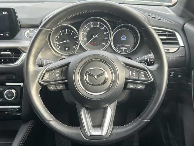 マツダ アテンザ セダン 25S Lパッケージ 沖縄県 2018(平30)年 0.6万km スノーフレイクホワイトパールマイカ 純正ナビ・TV・Bluetooth・CD・DVD/バックカメラ/ドライブレコーダー/BOSEサウンド/コーナーセンサー　/ハンドルヒーター/パワーシート/シートヒーター/シートメモリー/オートライト/電動格納ミラー/レーンキープアシスト/LEDヘッドライト/電子サイドブレーキ