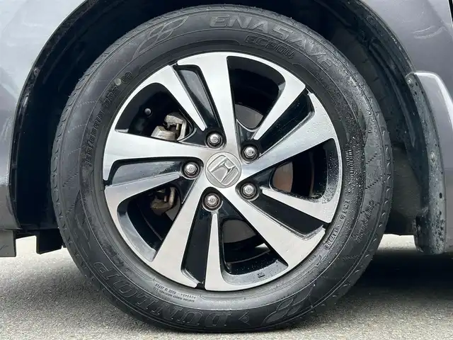 ホンダ フリード G ホンダセンシング 静岡県 2016(平28)年 6.1万km モダンスティールM HondaSENSING/純正9インチプレミアムインターナビ/ （VXM-175VFNi）/   AM FM CD DVD Bluetooth SD MusicRack/フルセグTV/バックモニター/ビルトインETC/両側パワースライドドア/アダプティブクルーズコントロール/アイドリングストップ/ステアリングスイッチ/ウォークスルー/純正15インチアルミホイール/本革巻ステアリング/電動格納ミラー/ドアバイザー/スマートキー＆プッシュスタート