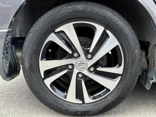 ホンダ フリード G ホンダセンシング 静岡県 2016(平28)年 6.1万km モダンスティールM HondaSENSING/純正9インチプレミアムインターナビ/ （VXM-175VFNi）/   AM FM CD DVD Bluetooth SD MusicRack/フルセグTV/バックモニター/ビルトインETC/両側パワースライドドア/アダプティブクルーズコントロール/アイドリングストップ/ステアリングスイッチ/ウォークスルー/純正15インチアルミホイール/本革巻ステアリング/電動格納ミラー/ドアバイザー/スマートキー＆プッシュスタート