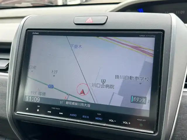 ホンダ フリード G ホンダセンシング 静岡県 2016(平28)年 6.1万km モダンスティールM HondaSENSING/純正9インチプレミアムインターナビ/ （VXM-175VFNi）/   AM FM CD DVD Bluetooth SD MusicRack/フルセグTV/バックモニター/ビルトインETC/両側パワースライドドア/アダプティブクルーズコントロール/アイドリングストップ/ステアリングスイッチ/ウォークスルー/純正15インチアルミホイール/本革巻ステアリング/電動格納ミラー/ドアバイザー/スマートキー＆プッシュスタート