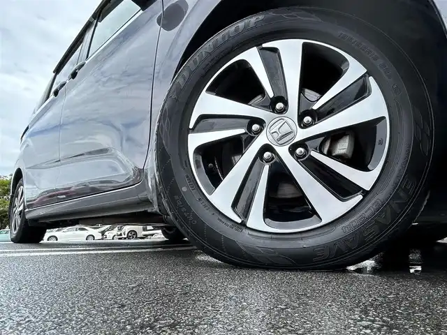 ホンダ フリード G ホンダセンシング 静岡県 2016(平28)年 6.1万km モダンスティールM HondaSENSING/純正9インチプレミアムインターナビ/ （VXM-175VFNi）/   AM FM CD DVD Bluetooth SD MusicRack/フルセグTV/バックモニター/ビルトインETC/両側パワースライドドア/アダプティブクルーズコントロール/アイドリングストップ/ステアリングスイッチ/ウォークスルー/純正15インチアルミホイール/本革巻ステアリング/電動格納ミラー/ドアバイザー/スマートキー＆プッシュスタート