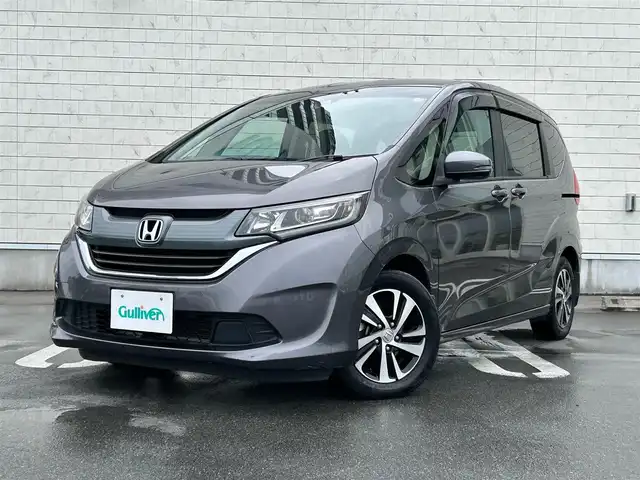 ホンダ フリード G ホンダセンシング 静岡県 2016(平28)年 6.1万km モダンスティールM HondaSENSING/純正9インチプレミアムインターナビ/ （VXM-175VFNi）/   AM FM CD DVD Bluetooth SD MusicRack/フルセグTV/バックモニター/ビルトインETC/両側パワースライドドア/アダプティブクルーズコントロール/アイドリングストップ/ステアリングスイッチ/ウォークスルー/純正15インチアルミホイール/本革巻ステアリング/電動格納ミラー/ドアバイザー/スマートキー＆プッシュスタート