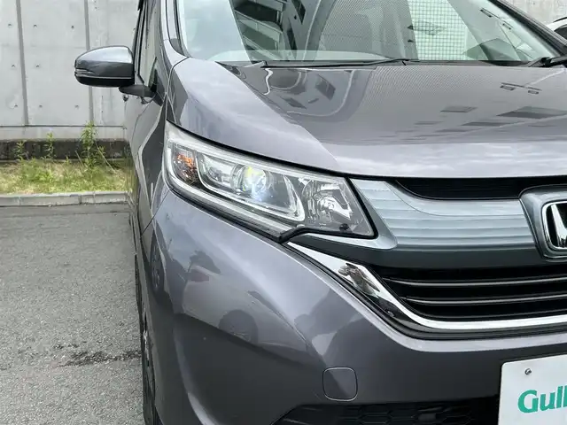 ホンダ フリード G ホンダセンシング 静岡県 2016(平28)年 6.1万km モダンスティールM HondaSENSING/純正9インチプレミアムインターナビ/ （VXM-175VFNi）/   AM FM CD DVD Bluetooth SD MusicRack/フルセグTV/バックモニター/ビルトインETC/両側パワースライドドア/アダプティブクルーズコントロール/アイドリングストップ/ステアリングスイッチ/ウォークスルー/純正15インチアルミホイール/本革巻ステアリング/電動格納ミラー/ドアバイザー/スマートキー＆プッシュスタート