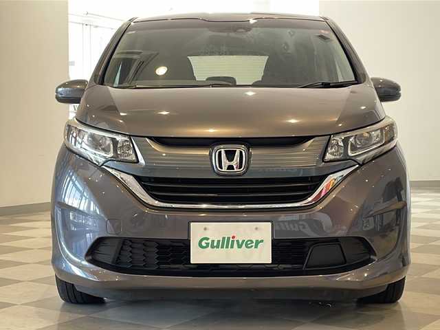 ホンダ フリード G ホンダセンシング 福井県 2016(平28)年 6.1万km モダンスティールM HondaSENSING/純正9インチプレミアムインターナビ/ （VXM-175VFNi）/   AM FM CD DVD Bluetooth SD MusicRack/フルセグTV/バックモニター/ビルトインETC/両側パワースライドドア/アダプティブクルーズコントロール/アイドリングストップ/ステアリングスイッチ/ウォークスルー/純正15インチアルミホイール/本革巻ステアリング/電動格納ミラー/ドアバイザー/スマートキー＆プッシュスタート