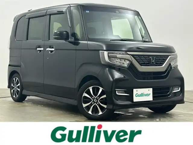 ホンダ Ｎ ＢＯＸ カスタム G EX ホンダセンシング 岡山県 2017(平29)年 7.3万km クリスタルブラックパール ワンオーナー/ホンダセンシング/・衝突被害軽減ブレーキ/・アダプティブクルーズコントロール/・車線維持支援システム/・オートハイビーム/純正8型SDナビゲーション/(CD/DVD/BT/SD/USB/AUX/フルセグTV)/バックカメラ/ビルトインETC/両側パワースライドドア/純正前方ドライブレコーダー/純正14インチアルミ/純正リアスポイラー/純正フロアマット/ステアリングリモコン/アイドリングストップ/リアサンシェイド/チルトステアリング/ウィンカーミラー/シートリフター/ドアバイザー/横滑り防止/スマートキー×2/新車保証書/取扱説明書/ナビ取扱説明書