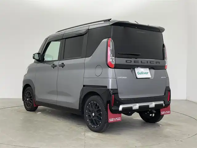 三菱 デリカミニ T プレミアム 富山県 2025(令7)年 0.7万km ガンＭⅡ ４WD/１オーナー/純正オーディオ（HDMI　BT CarPlay androidauto）/全周囲カメラ/前後コーナーセンサー/ビルトインETC/前席シートヒーター/ステアリングヒーター/両側パワースライドドア（フットオープン可）/純正AW付きスタッドレスタイヤセット積込み/オートライト/LEDヘッドライト/フォグ/スマートキー/プッシュスタート/ACC/衝突軽減ブレーキ/車線逸脱警報/車線逸脱防止支援/MIパイロット（車線維持支援）/先行車発進お知らせ/ヒルディセントコントロール/ルーフレール（黒）/パドルシフト/純正マット・バイザー/デジタルインナーミラー/オートホールド/横滑防止装置/保証書、取説/スペアキー