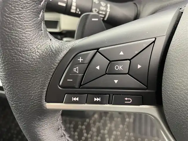 三菱 デリカミニ T プレミアム 富山県 2025(令7)年 0.7万km ガンＭⅡ ４WD/１オーナー/純正オーディオ（HDMI　BT CarPlay androidauto）/全周囲カメラ/前後コーナーセンサー/ビルトインETC/前席シートヒーター/ステアリングヒーター/両側パワースライドドア（フットオープン可）/純正AW付きスタッドレスタイヤセット積込み/オートライト/LEDヘッドライト/フォグ/スマートキー/プッシュスタート/ACC/衝突軽減ブレーキ/車線逸脱警報/車線逸脱防止支援/MIパイロット（車線維持支援）/先行車発進お知らせ/ヒルディセントコントロール/ルーフレール（黒）/パドルシフト/純正マット・バイザー/デジタルインナーミラー/オートホールド/横滑防止装置/保証書、取説/スペアキー