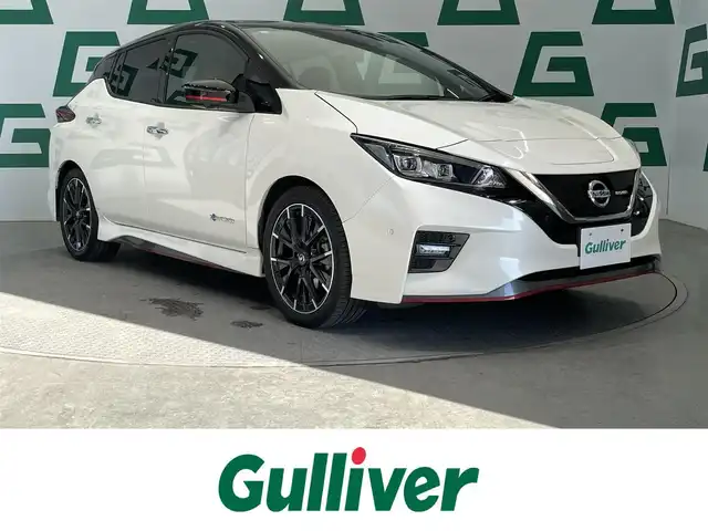 日産 リーフ ニスモ 鹿児島県 2018(平30)年 5.3万km ブリリアントホワイトパール/スーパーブラック 2トーン 禁煙車/アラウンドビューモニター/純正ナビ/　（Bluetooth接続.CD.DVD.フルセグTV)/デジタルインナーミラー/テレビキャンセラー/ETC/ドライブレコーダー/プロパイロット/BSM/前席シートヒーター/ステアリングヒーター/電動パーキングブレーキ/本革巻きステアリング/革調シートカバー/電動格納ミラー/純正フロアマット/純正アルミホイール