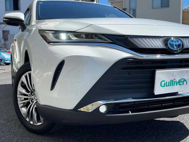 トヨタ ハリアー ハイブリッド Z 神奈川県 2022(令4)年 2.5万km ホワイトパールクリスタルシャイン ワンオーナー/純正メモリーナビ・地デジTV/JBLスピーカー/デジタルインナーミラー/バックモニター/ハーフレザーシート/運転席パワーシート/トヨタセーフティセンス/レーダークルーズコントロール/PCS/LTA/BSM/RCTA/PKSB/RSA/コーナーセンサー/オートハイビーム/コーナーセンサー/純正19インチAW/LEDライト/LEDフォグ/パワーバックドア/HUD/純正USB/BT/Miracast/ビルトインETC2.0/プッシュスタート/スマートキー×2/社外ゴムマット/R4/5/6年ディーラー整備記録/保証書・取説あり