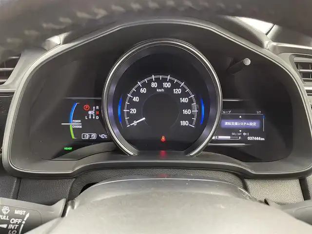 ホンダ フィット ハイブリット S ホンダセンシング 福井県 2019(令1)年 3.8万km ルージュアメジストM ホンダセンシング/・衝突軽減ブレーキ/・クルーズコントロール（追従なし）/・車線逸脱警報機能/純正ナビゲーション/【AM/FM/CD/DVD/Bluetooth/フルセグTV】/バックカメラ/ビルトインETC/プッシュスタート/スマートキー/スペアキー/オートライト/LEDヘッドライド/パドルシフト