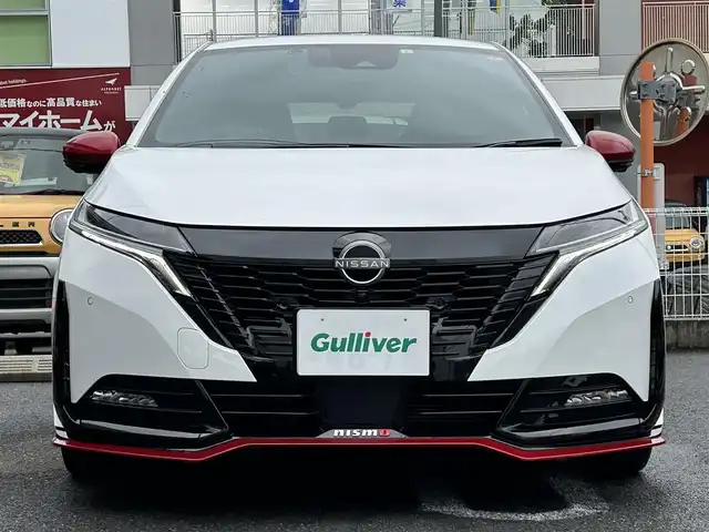 日産 オーラ ニスモ 長崎県 2023(令5)年 5.5万km ピュアホワイトパール ワンオーナー/純正HDDナビ(FM/AM/USB/BT/フルセグ)/プッシュスタート/スマートキー/ステアリングスイッチ/ビルトインETC2.0/ワイヤレス充電/純正フロアマット/純正17インチアルミホイール/ドアバイザー/プロパイロット/ハンドル支援/レーダークルーズコントロール/車線逸脱警報/ふらつき抑制/踏み間違い衝突防止/前後コーナーセンサー/オートライト/オートマチックハイビーム/LEDヘッドライト/イモビライザーシステム/SRSダブル・サイドエアバッグ/SRSカーテンエアバッグ/ISOFIX/スペアキー/車両取説/ナビ取説/保証書