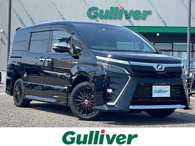 トヨタ ヴォクシー ハイブリッド ZS 煌Ⅱ 島根県 2020(令2)年 8.1万km ブラック 純正SDナビ（NSZT-W68T）/バックカメラ/ビルトインETC/前後ドライブレコーダー/両側パワースライドドア/クルーズコントロール/プリクラッシュセーフティシステム/プッシュスタート/シートヒーター/LEDヘッドライト/オートハイビーム/ISOFIX/純正16インチAW積み込み/純正フロアマット/保証書/取扱説明書/スペアキー