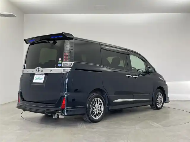 トヨタ ヴォクシー ハイブリッド ZS 煌Ⅱ 埼玉県 2019(平31)年 6.3万km ブラッキッシュアゲハガラスフレーク モデリスタフルエアロ/モデリスタマフラー/モデリスタヘッドライトガーニッシュ/モデリスタシグネチャーイルミブレード/モデリスタドアハンドルガーニッシュ/純正10インチSDナビ/(CD/DVD/Bluetooth/USB/HDMI/音楽録音/フルセグ)/フリップダウンモニター/両側パワースライドドア/バックカメラ/ドライブレコーダー/プリクラッシュセーフティ/クルーズコントロール/ビルトインETC2.0/シートヒーター/オートLEDライト/純正16インチアルミホイール
