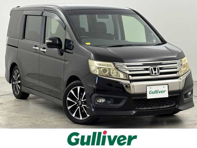 ホンダ ステップワゴン スパーダ Z クールスピリット 福岡県 2013(平25)年 9.2万km プレミアムスパークルブラックパール 純正９型ナビ（フルセグＴＶ）　/バックカメラ　/ビルトインＥＴＣ　/クルーズコントロール　/横滑り防止　/アイドリングストップ　/ＥＣＯＮ　/パドルシフト　/両側電動スライドドア　/ハーフレザー　/純正１７インチＡＷ