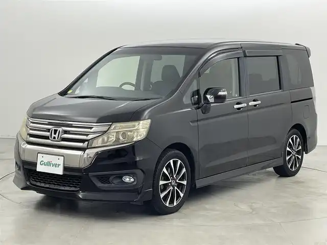 ホンダ ステップワゴン スパーダ Z クールスピリット 福岡県 2013(平25)年 9.2万km プレミアムスパークルブラックパール 純正９型ナビ（フルセグＴＶ）　/バックカメラ　/ビルトインＥＴＣ　/クルーズコントロール　/横滑り防止　/アイドリングストップ　/ＥＣＯＮ　/パドルシフト　/両側電動スライドドア　/ハーフレザー　/純正１７インチＡＷ