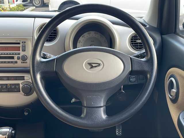 ダイハツ ミラ ジーノ X 青森県 2006(平18)年 4万km ブリティッシュグリーンマイカ 4WD/純正オーディオ/CD・MD/社外13インチアルミホイール/オートエアコン/パワーステアリング/パワーウィンドウ/リモコンキー/ドアバイザー/フロアマット/セキュリティアラーム