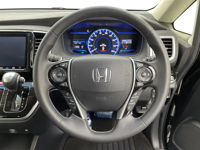 ホンダ オデッセイ ハイブリッド アブソルート・EXホンダセンジング 宮城県 2019(令1)年 6.7万km クリスタルブラックパール 純正９型ナビ/全周囲カメラ/ＢＳＭ/パーキングアシスト/前席シートヒーター/前席パワーシート/純正エンジンスターター/センターコンソール/アームレスト/100V電源/ホンダセンシング/両側パワースライドドア/ハーフレザーシート/ETC2.0/前後ドライブレコーダー/禁煙車