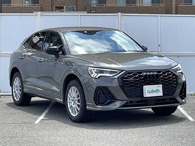 アウディ アウディ Ｑ３ SB 35TDIクワトロ Sライン 秋田県 2023(令5)年 7.1万km グレー メーカー純正ナビ/・BT/・USB/・ラジオ/クルーズコントロール/横滑り防止装置/アイドリングストップ/ステアリングスイッチ/パドルシフト/オートライト/電動格納ミラー/全席オートウィンドウ/シートヒーター/純正フロアマット/ETC2.0/ドライブレコーダー/純正AW組夏タイヤ積載