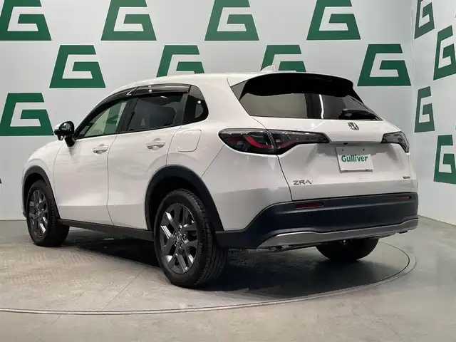 ホンダ ＺＲ－Ｖ ハイブリッド e:HEV X 鹿児島県 2023(令5)年 1万km プラチナホワイトパール 禁煙車/純正11インチGathersナビ/　・Bluetooth/　・AppleCarPlay/　・AndroidAuto/　・CD/DVD/　・フルセグTV/　・AM/FM/ホンダセンシング/　・クルーズコントロール(追従走行あり)/　・レーンキープアシスト/　・ブラインドスポットモニター/　・オートマチックハイビーム/バックカメラ/ETC/前後コーナーセンサー/電動パーキングブレーキ/ブレーキホールド/全席オートパワーウィンドウ/オートワイパー/シートヒーター/電動格納ミラー/ボタン式シフト/パドルシフト/ステアリングリモコン