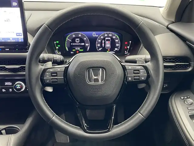 ホンダ ＺＲ－Ｖ ハイブリッド e:HEV X 鹿児島県 2023(令5)年 1万km プラチナホワイトパール 禁煙車/純正11インチGathersナビ/　・Bluetooth/　・AppleCarPlay/　・AndroidAuto/　・CD/DVD/　・フルセグTV/　・AM/FM/ホンダセンシング/　・クルーズコントロール(追従走行あり)/　・レーンキープアシスト/　・ブラインドスポットモニター/　・オートマチックハイビーム/バックカメラ/ETC/前後コーナーセンサー/電動パーキングブレーキ/ブレーキホールド/全席オートパワーウィンドウ/オートワイパー/シートヒーター/電動格納ミラー/ボタン式シフト/パドルシフト/ステアリングリモコン