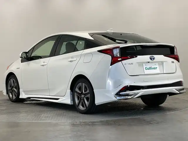 トヨタ プリウス Sツーリングセレクション 栃木県 2019(平31)年 1.8万km ホワイトパールクリスタルシャイン 純正ナビ/　(CD/DVD/Bluetooth/フルセグV)/バックカメラ/モデリスタ風エアロ/トヨタセーフティセンス/・プリクラッシュセーフティ/・レーントレーシングアシスト/・レーンディパーチャーアラート/・ロードサインアシスト/・レーダークルーズコントロール/・オートマチックハイビーム/・先行車発進アラーム/ETC/前後ドラレコ/前席シートヒーター/禁煙車/LEDヘッドライト/スマートキー/純正AW/純正フロアマット
