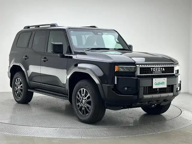 トヨタ ランドクルーザー ２５０ VX 兵庫県 2024(令6)年 0.1千km ブラック ・純正メモリナビ/（HDMI/Bluetooth/フルセグ/Miracast/USB）/・純正ディスプレイオーディオ/・ACC/・LDA/・PCS/・BSM/・PDA/・RCTA/・RCD/・RSA/・コーナーセンサー/・パノラミックビューモニター/・デジタルインナーミラー/・安心降車サポート/・ビルトインETC2.0/・パワーバックドア/・D＋N席パワーシート/・D＋N席シートヒーター/・黒レザーシート/・ベンチレーション/・ステアリングヒーター/・ルーフレール/・MODELLISTAオーバーフェンダー/・純正18インチアルミホイール/・LEDヘッドライト/・ＬＥＤフォグランプ/・オートハイビーム