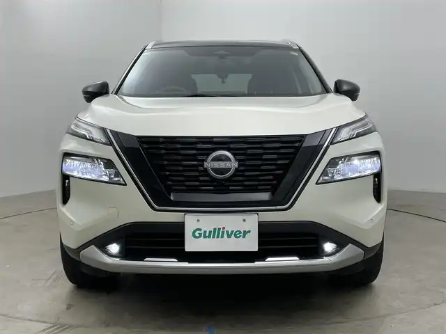 日産 エクストレイル G e－4ORCE 岡山県 2024(令6)年 3.2万km ブリリアントホワイトパール/スーパーブラック 2トーン 純正12.3インチナビ/・FM/AM/Bluetooth/フルセグ/CarPlay/アラウンドビューモニター/デジタルインナーミラー/合皮シート/・パワーシート/・シートヒーター/・シートメモリー/ステアリングヒーター/パワーバックドア/HUD/ワイヤレス充電/プロパイロット/インテリジェントエマージェンシーブレーキ/パーキングアシスト/コーナーセンサー/AC100V/ドライブレコーダー/ビルトインETC2.0/純正19インチアルミ/純正フロアマット