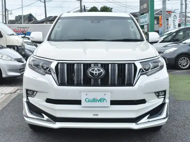 トヨタ ランドクルーザー プラド TX Lパッケージ 神奈川県 2023(令5)年 1万km ホワイトパールクリスタルシャイン ワンオーナー/モデリスタエアロ/純正メモリナビ/フルセグテレビ/全方位カメラ/サンルーフ/レザーシート/エアーシート/シートヒーター/クルーズコントロール/ETC2.0/LEDヘッドライト/保証書/取説/ナビ説/記録(R.6)/スペアスマートキー
