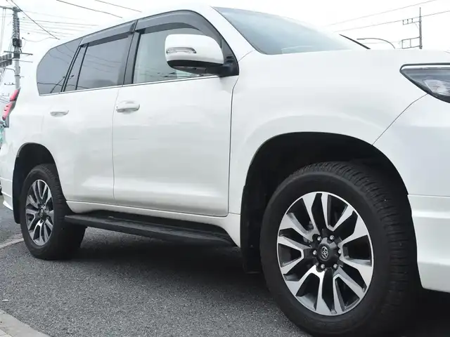 トヨタ ランドクルーザー プラド TX Lパッケージ 神奈川県 2023(令5)年 1万km ホワイトパールクリスタルシャイン ワンオーナー/モデリスタエアロ/純正メモリナビ/フルセグテレビ/全方位カメラ/サンルーフ/レザーシート/エアーシート/シートヒーター/クルーズコントロール/ETC2.0/LEDヘッドライト/保証書/取説/ナビ説/記録(R.6)/スペアスマートキー