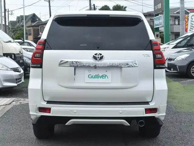 トヨタ ランドクルーザー プラド TX Lパッケージ 神奈川県 2023(令5)年 1万km ホワイトパールクリスタルシャイン ワンオーナー/モデリスタエアロ/純正メモリナビ/フルセグテレビ/全方位カメラ/サンルーフ/レザーシート/エアーシート/シートヒーター/クルーズコントロール/ETC2.0/LEDヘッドライト/保証書/取説/ナビ説/記録(R.6)/スペアスマートキー