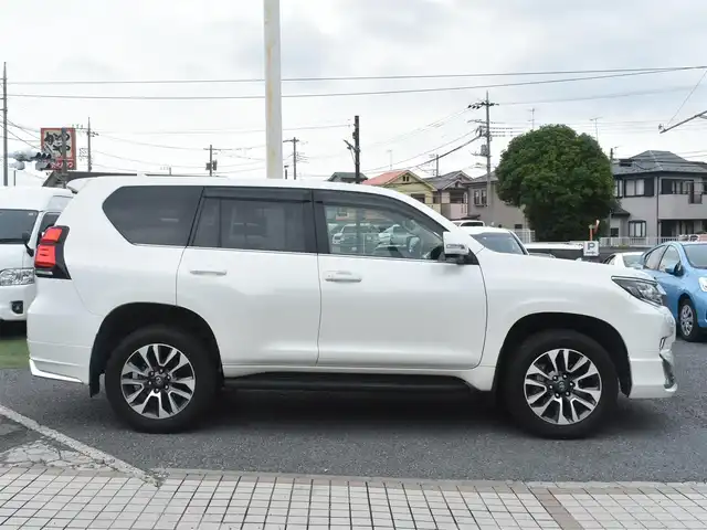 トヨタ ランドクルーザー プラド TX Lパッケージ 神奈川県 2023(令5)年 1万km ホワイトパールクリスタルシャイン ワンオーナー/モデリスタエアロ/純正メモリナビ/フルセグテレビ/全方位カメラ/サンルーフ/レザーシート/エアーシート/シートヒーター/クルーズコントロール/ETC2.0/LEDヘッドライト/保証書/取説/ナビ説/記録(R.6)/スペアスマートキー