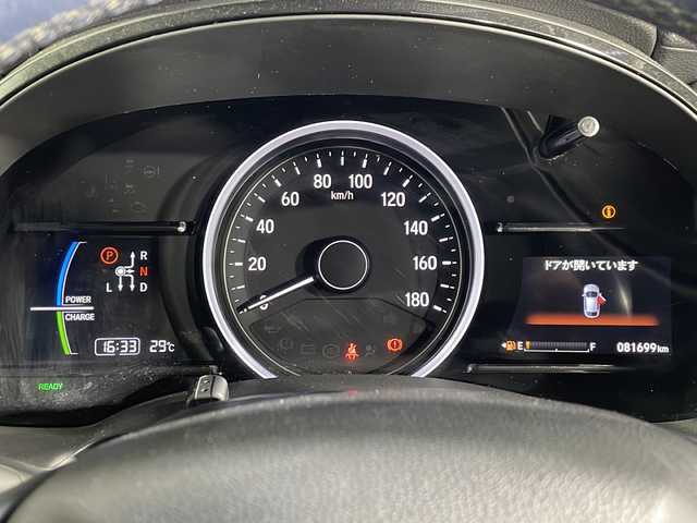 ホンダ シャトル ハイブリッド Z ホンダセンシング 沖縄県 2018(平30)年 8.2万km プラチナホワイトパール 禁煙車/ホンダセンシング/・衝突軽減ブレーキ/・歩行者事故低減ステアリング/・路外逸脱抑制機能/・アダプティブ・クルーズ・コントロール/純正ナビ（VXM-195VＦi)/・ＣＤ／ＤＶＤ／Ｂｌｕｅｔｏｏｔｈ／フルセグＴＶ/純正前後ドライブレコーダー/バックカメラ/レーンキープアシスト/コーナーセンサー/パドルシフト/ハーフレザーシート/パドルシフト/純正フロアマット/スマートキー/LEDヘッドライト/純正アルミ/保証書/取扱説明書