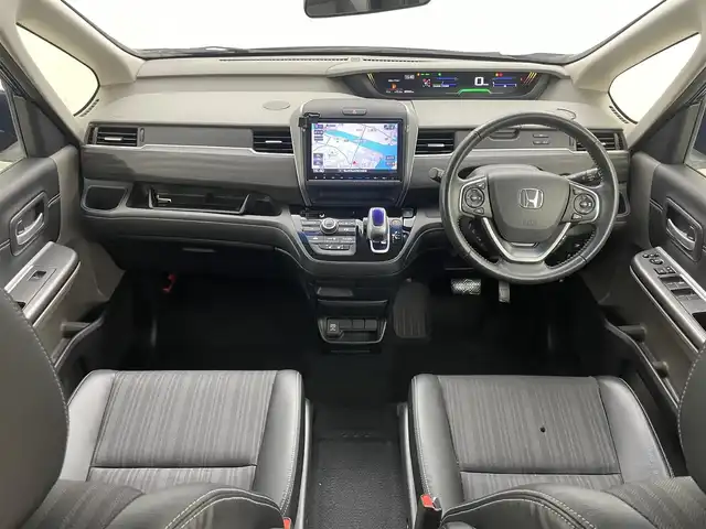 ホンダ フリード ハイブリット EX 岡山県 2016(平28)年 5.7万km コバルトブルーパール 純正9インチナビ【VXM-175VFNi】/(AM/FM/DVD/CD/BT/フルセグ)/社外フリップダウンモニター【TVM-FW1030】/両側パワースライドドア/衝突軽減ブレーキ/バックカメラ/アダプティブクルーズコントロール/社外360度ドライブレコーダー/ハーフレザー/前席シートヒーター/後席サンシェイド/純正アルミホイール/ＬＥＤヘッドライト/オートライト