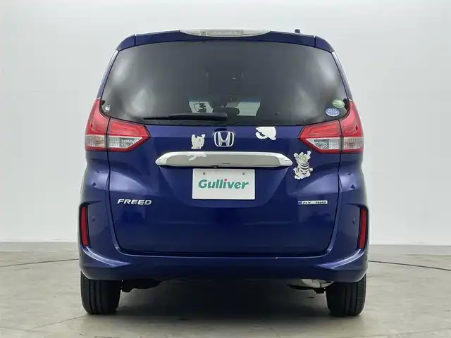 ホンダ フリード ハイブリット EX 岡山県 2016(平28)年 5.7万km コバルトブルーパール 純正9インチナビ【VXM-175VFNi】/(AM/FM/DVD/CD/BT/フルセグ)/社外フリップダウンモニター【TVM-FW1030】/両側パワースライドドア/衝突軽減ブレーキ/バックカメラ/アダプティブクルーズコントロール/社外360度ドライブレコーダー/ハーフレザー/前席シートヒーター/後席サンシェイド/純正アルミホイール/ＬＥＤヘッドライト/オートライト