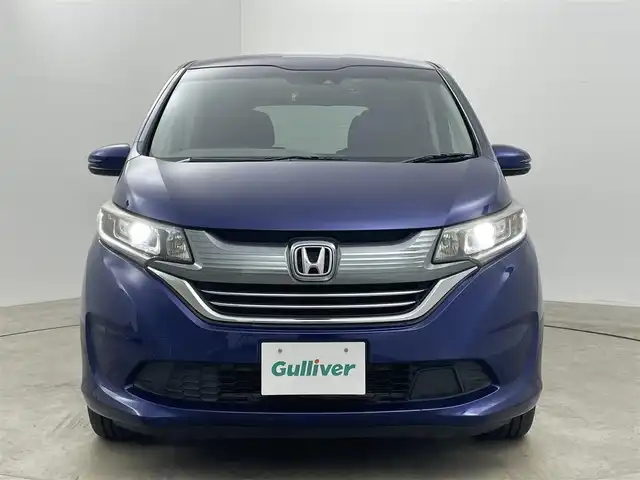 ホンダ フリード ハイブリット EX 岡山県 2016(平28)年 5.7万km コバルトブルーパール 純正9インチナビ【VXM-175VFNi】/(AM/FM/DVD/CD/BT/フルセグ)/社外フリップダウンモニター【TVM-FW1030】/両側パワースライドドア/衝突軽減ブレーキ/バックカメラ/アダプティブクルーズコントロール/社外360度ドライブレコーダー/ハーフレザー/前席シートヒーター/後席サンシェイド/純正アルミホイール/ＬＥＤヘッドライト/オートライト