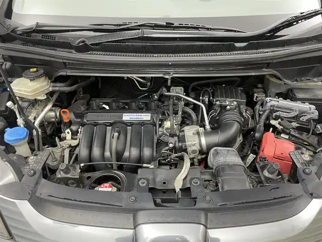 ホンダ フリード ハイブリット EX 岡山県 2016(平28)年 5.7万km コバルトブルーパール 純正9インチナビ【VXM-175VFNi】/(AM/FM/DVD/CD/BT/フルセグ)/社外フリップダウンモニター【TVM-FW1030】/両側パワースライドドア/衝突軽減ブレーキ/バックカメラ/アダプティブクルーズコントロール/社外360度ドライブレコーダー/ハーフレザー/前席シートヒーター/後席サンシェイド/純正アルミホイール/ＬＥＤヘッドライト/オートライト