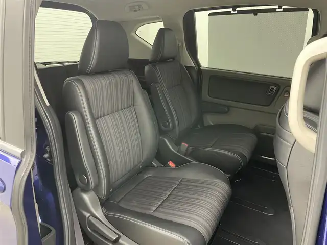 ホンダ フリード ハイブリット EX 岡山県 2016(平28)年 5.7万km コバルトブルーパール 純正9インチナビ【VXM-175VFNi】/(AM/FM/DVD/CD/BT/フルセグ)/社外フリップダウンモニター【TVM-FW1030】/両側パワースライドドア/衝突軽減ブレーキ/バックカメラ/アダプティブクルーズコントロール/社外360度ドライブレコーダー/ハーフレザー/前席シートヒーター/後席サンシェイド/純正アルミホイール/ＬＥＤヘッドライト/オートライト