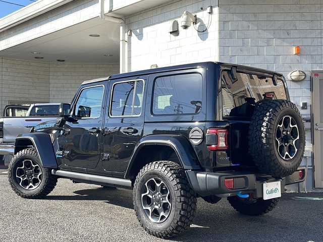 クライスラー・ジープ ジープ ラングラー アンリミテッド ルビコン 4xe 神奈川県 2023(令5)年 1.5万km ブラック ワンオーナー/左ハンドル/４WD/純正ナビ（AM/FM/USB/AUX/BT/フルセグTV)/全方位カメラ/前後ドライブレコーダー/ETC2.0/レーダークルーズコントロール/パーキングセンサー/ヒルスタート/ブラインドスポットモニター/ステアリングスイッチ/衝突軽減システム/横滑り防止装置/ソフトトップ/ステアリングヒーター/ミラーヒーター/黒革シート/D/N席シートヒーター/純正アルミホイール/純正フロアマット/ISOFIX/オートライト/スペアキー×１/保証書/取扱説明書