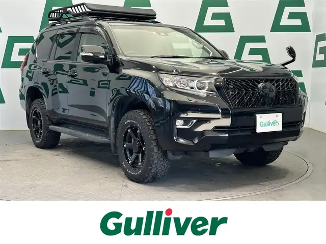 トヨタ ランドクルーザー プラド TX Lパッケージ 鹿児島県 2018(平30)年 8.9万km アティチュードブラックマイカ アルパイン9インチナビ（X9Z）/アルパインフリップダウンモニター/バックカメラ/サンルーフ/社外前後ドライブレコーダー/ビルトインETC/前席ベンチレーション/前席パワーシート/前席シートヒーター/木目調革巻きステアリング/社外フロントグリル/アダプティブクルーズコントロール/レーンキープアシスト/LEDヘッドライト/フルセグTV/純正フロアマット/社外17インチアルミホイール（MKW）