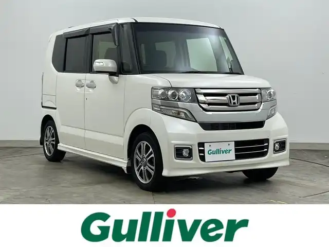 ホンダ Ｎ ＢＯＸ カスタム SSパッケージ 岡山県 2016(平28)年 6.6万km プレミアムホワイトパールⅡ 純正ナビ　/(CD/DVD/USB/SD/Bluetooth)/両側電動スライド　/ビルトインＥＴＣ　/前席シートヒーター　/ＬＥＤヘッドライト　/バックカメラ/プッシュスタート　/スマートキー　/アイドリングストップ/ISOFIX/後席サンシェード/ステアリングスイッチ/チルトステアリング/シートリフター/シートバックテーブル/ウィンカーミラー/ドアバイザー