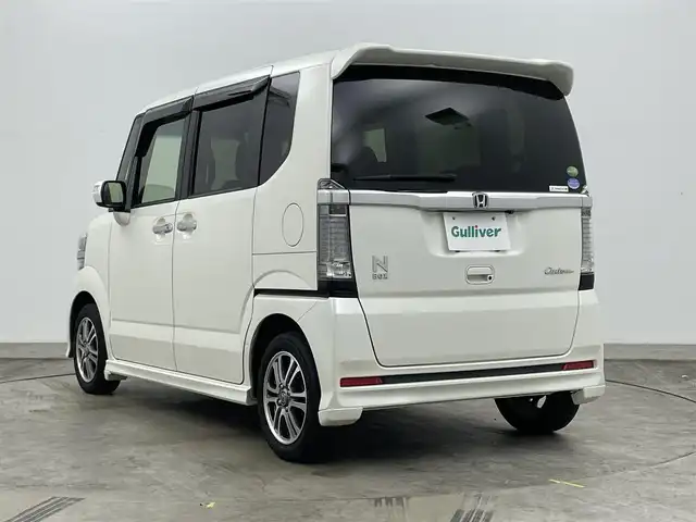 ホンダ Ｎ ＢＯＸ カスタム SSパッケージ 岡山県 2016(平28)年 6.6万km プレミアムホワイトパールⅡ 純正ナビ　/(CD/DVD/USB/SD/Bluetooth)/両側電動スライド　/ビルトインＥＴＣ　/前席シートヒーター　/ＬＥＤヘッドライト　/バックカメラ/プッシュスタート　/スマートキー　/アイドリングストップ/ISOFIX/後席サンシェード/ステアリングスイッチ/チルトステアリング/シートリフター/シートバックテーブル/ウィンカーミラー/ドアバイザー