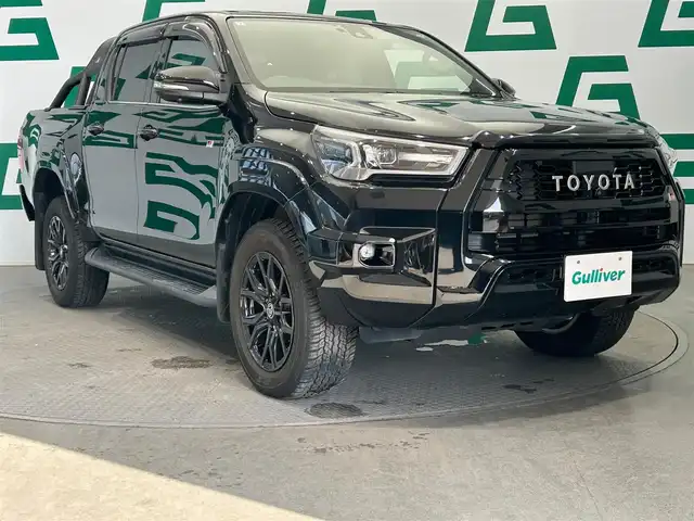 トヨタ ハイラックス Z GRスポーツ 鹿児島県 2022(令4)年 2.4万km アティチュードブラックマイカ 禁煙車/純正ディスプレイオーディオ/（Bluetooth/Applecarplay/Androidauto）/パノラミックビューモニター/ETC/社外前後ドライブレコーダー/トヨタセーフティセンス/・アダプティブクルーズコントロール/・レーンキープアシスト/・プリクラッシュセーフティ/・ロードサインアシスト/ダウンヒルアシストコントロール/リアデフロック/GRスポーツバー/GRロゴ入りフロントグリル/GRロゴブレーキキャリパー/本革巻ステアリング