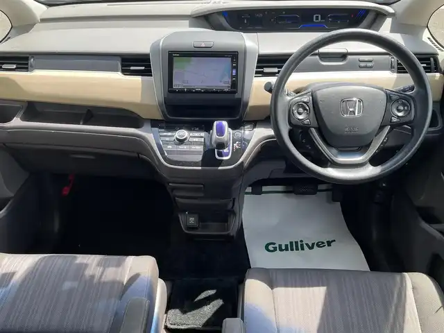 ホンダ フリード ハイブリット G ホンダセンシング 長崎県 2018(平30)年 10.6万km プレミアムクリスタルレッドM ワンオーナー/純正ナビ/(フルセグ・DVD・CD・SD・BT)/バックカメラ/ドライブレコーダー/ホンダセンシング/ETC/レーダークルーズコントロール/レーンキープアシスト/ステアリングスイッチ/両側パワースライドドア/スペアキー/スマートキー/LEDヘッドライト/オートライト/純正フロアマット