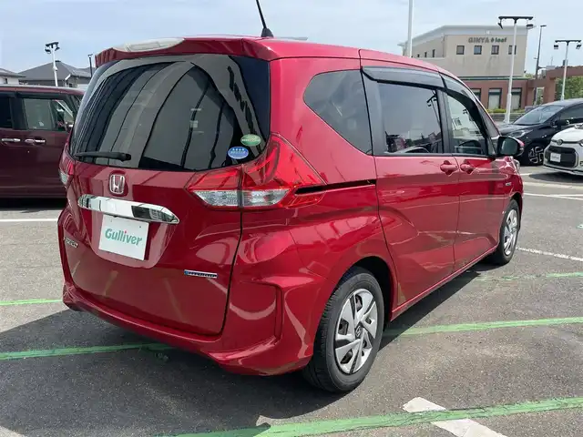 ホンダ フリード ハイブリット G ホンダセンシング 長崎県 2018(平30)年 10.6万km プレミアムクリスタルレッドM ワンオーナー/純正ナビ/(フルセグ・DVD・CD・SD・BT)/バックカメラ/ドライブレコーダー/ホンダセンシング/ETC/レーダークルーズコントロール/レーンキープアシスト/ステアリングスイッチ/両側パワースライドドア/スペアキー/スマートキー/LEDヘッドライト/オートライト/純正フロアマット
