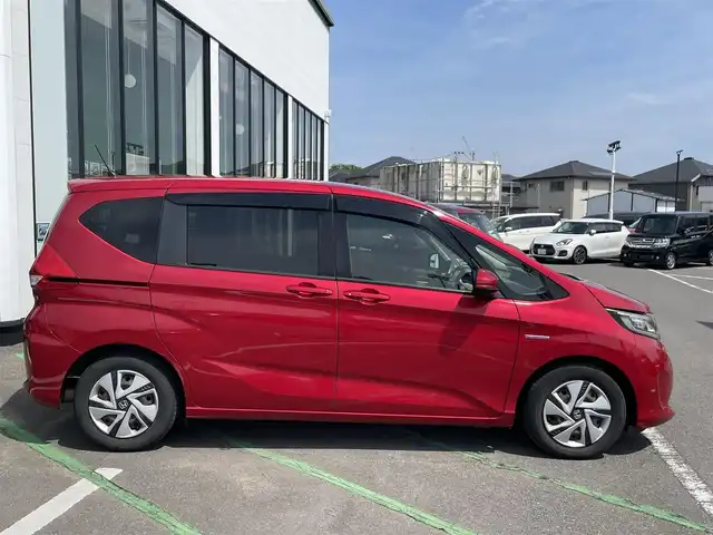 ホンダ フリード ハイブリット G ホンダセンシング 長崎県 2018(平30)年 10.6万km プレミアムクリスタルレッドM ワンオーナー/純正ナビ/(フルセグ・DVD・CD・SD・BT)/バックカメラ/ドライブレコーダー/ホンダセンシング/ETC/レーダークルーズコントロール/レーンキープアシスト/ステアリングスイッチ/両側パワースライドドア/スペアキー/スマートキー/LEDヘッドライト/オートライト/純正フロアマット